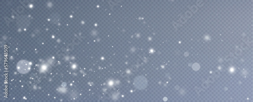 Dust sparks and stars shine with a special light. Christmas light effect. Glittering particles of magic dust.Vector sparkles on a transparent background.