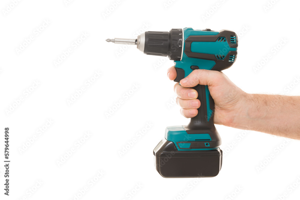 Young adult man hand holding and showing dark black green professional battery screwdriver isolated on white background. Closeup. Tool for repair work. Side view. Young adult man hand holding and showing dark black green professional battery screwdriver isolated on white background. Closeup. Tool for repair work. Side view.