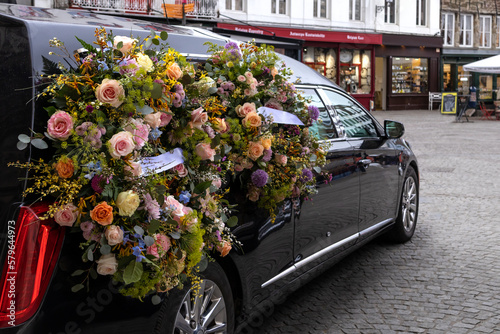Hearse with floral wreath. photo