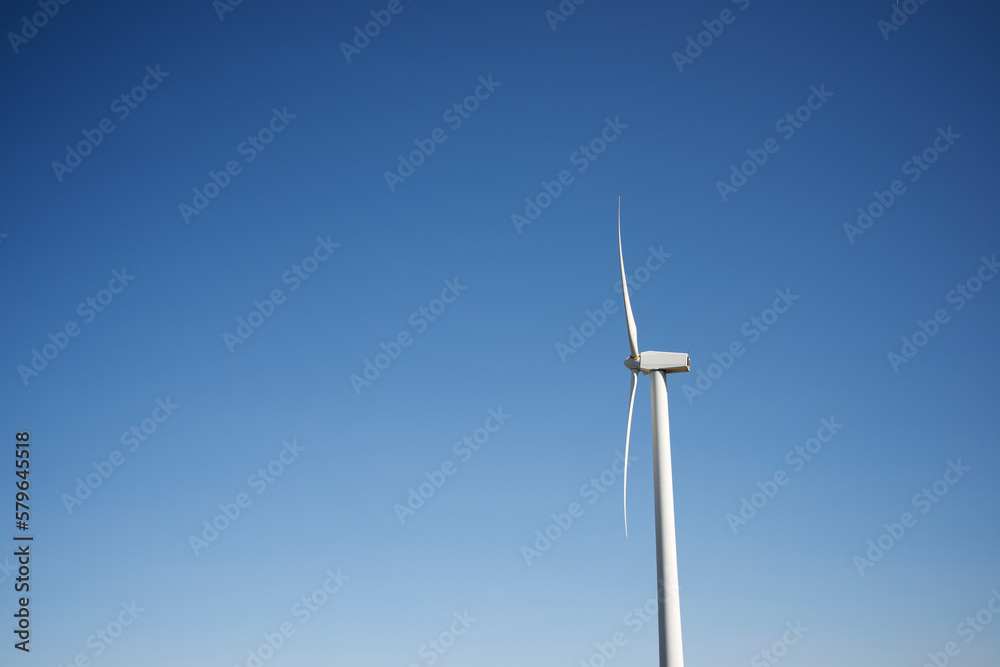 Low angle view of wind turbine against clear sky Low angle view of wind turbine against clear sky