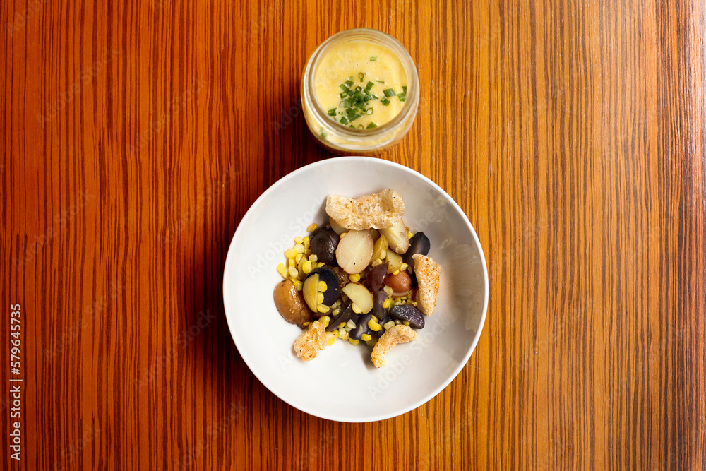 Overhead view of food with drink served on wooden table Overhead view of food with drink served on wooden table