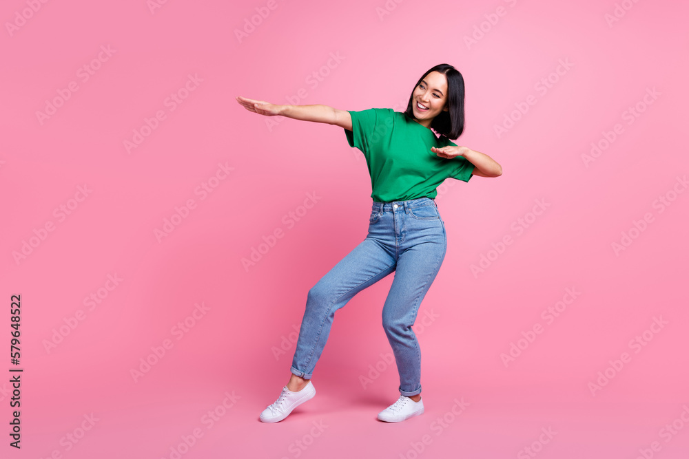 Full body portrait of cheerful carefree lady have fun dancing chilling isolated on pink color background