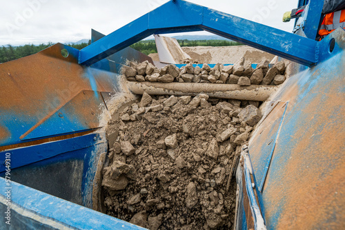Industrial belt conveyor moving raw materials from mine