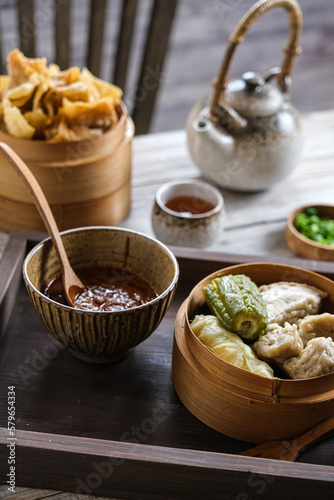 siomay and batagor is Indonesian traditional food, steamed and fried dumpling with peanut sauce