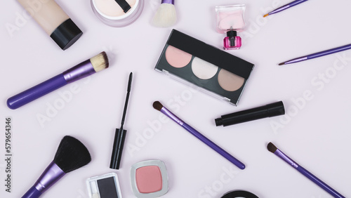set of professional decorative cosmetics, makeup tools and accessories on a color background. beauty and fashion concept. top view. flat lay.