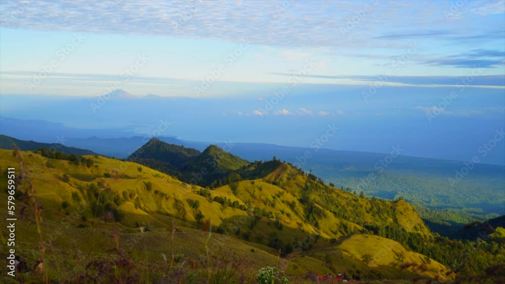 Top of Mt Ranjani Lombok Sun light sunrise movement Indonesia Bali Timelapse peaceful sunrise cloud passing by mountain scape Volcano Top of Mt Ranjani Lombok Sun light sunrise movement Indonesia Bali Timelapse peaceful sunrise cloud passing by mountain scape Volcano