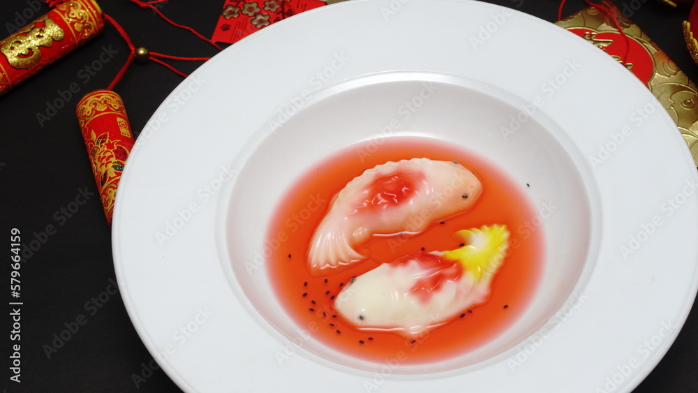 Fish jelly chinese food on plate in chinese new year celebration Fish jelly chinese food on plate in chinese new year celebration