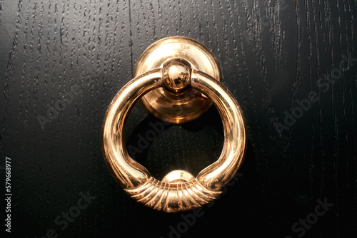 Golden door knocker