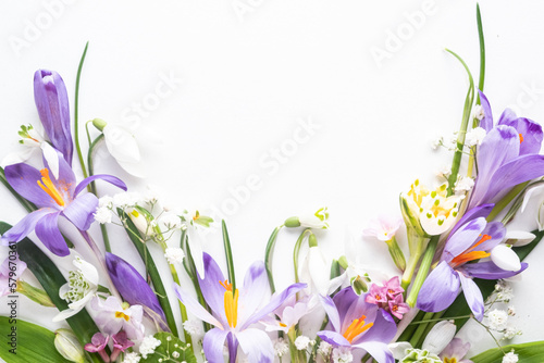  flower flat lay from different spring flowers on a white background. Top view and copy space.