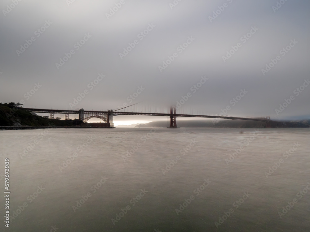 San Francisco Golden Gate Bridge at the state of California embedded in fog San Francisco Golden Gate Bridge at the state of California embedded in fog