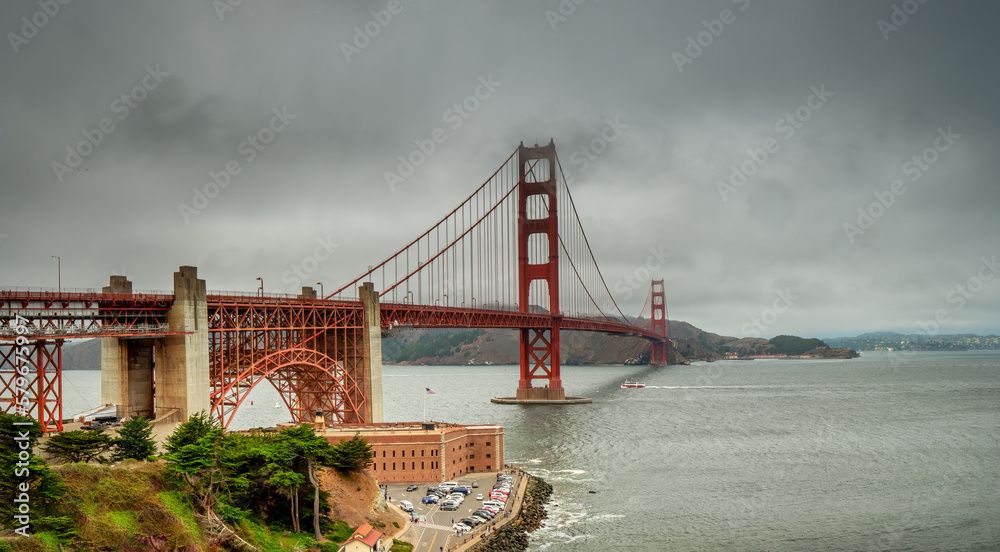 San Francisco Golden Gate Bridge at the state of California embedded in fog