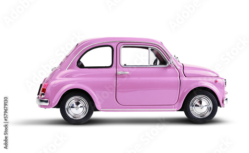 Pink vintage toy car isolated on white background