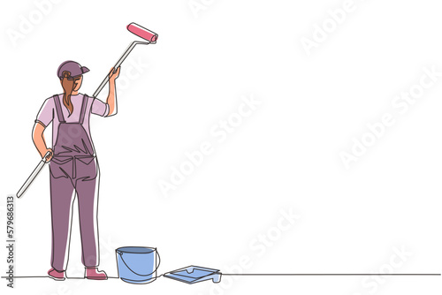 Single continuous line drawing woman painting wall with roller. Vector concept illustration on home repair, renovation, freshen up. Female painter professional at work. One line draw design graphic