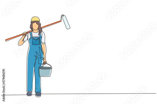 Single continuous line drawing female painter with bucket of paint and paint roller. Professional repairwoman in overalls on the background of apartment renovation. One line draw graphic design vector