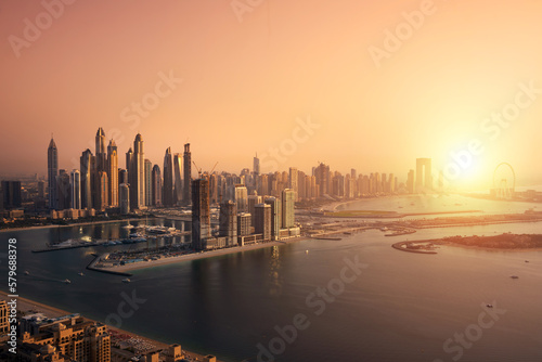 Photography Dubai skyline on sunset, modern city with skyscrapers