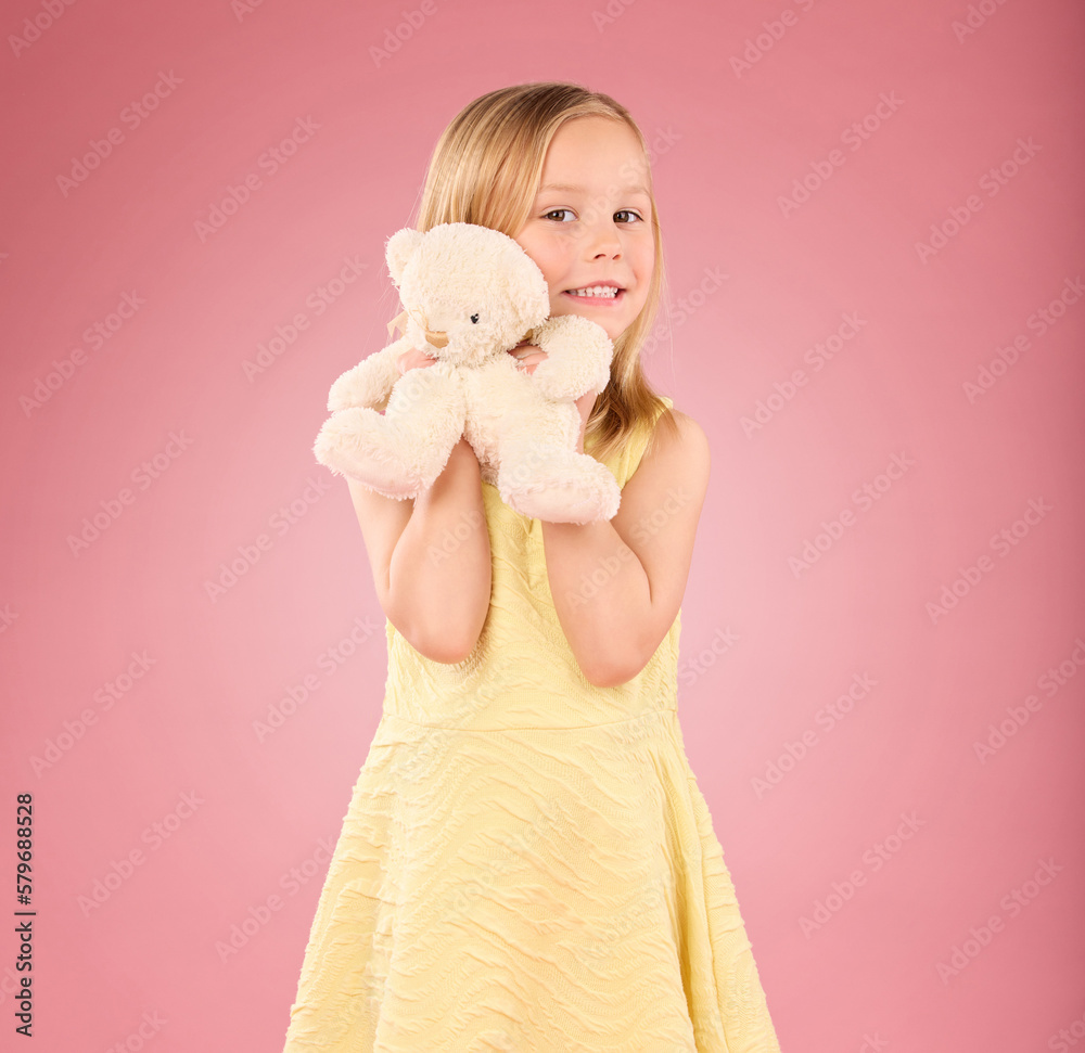 Teddy bear, girl and portrait with a soft toy with happiness and love for toys in a studio. Isolated, pink background and a young female child feeling happy, joy and cheerful with stuffed friend Teddy bear, girl and portrait with a soft toy with happiness and love for toys in a studio. Isolated, pink background and a young female child feeling happy, joy and cheerful with stuffed friend