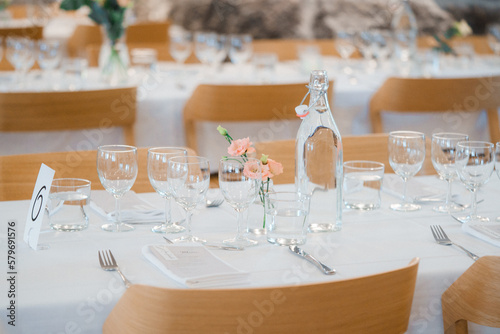 wedding table decoration with flowers and cutlery on table