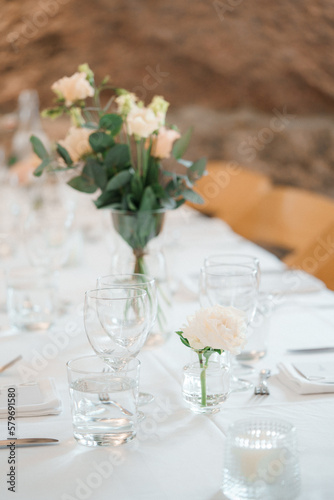 wedding table decoration with flowers and cutlery on table