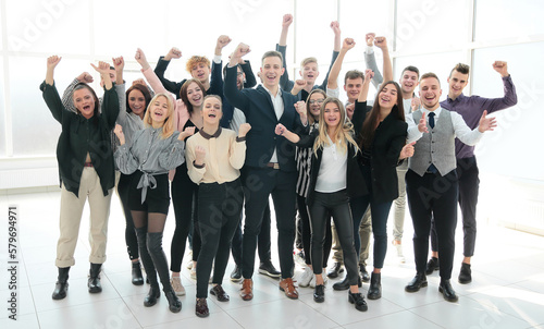 group of happy young business people celebrating together