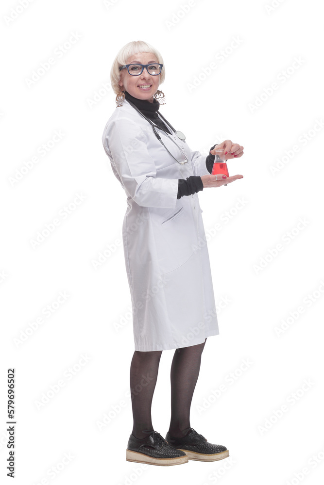 in full growth. female doctor with a laboratory flask. in full growth. female doctor with a laboratory flask.