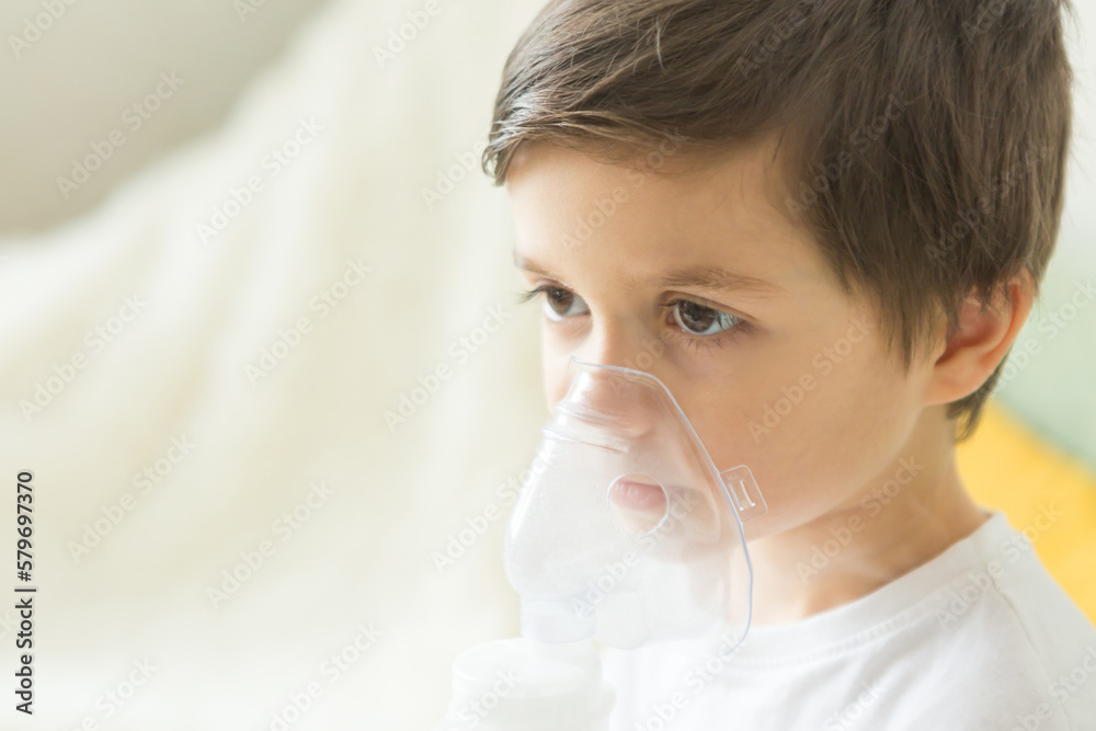portrait of a boy doing inhalation portrait of a boy doing inhalation