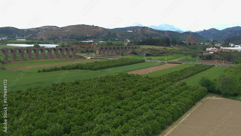 Aerial revealing shot of the historic site of Aspendos Aqueduct, Turkey Aerial revealing shot of the historic site of Aspendos Aqueduct, Turkey