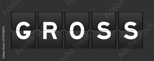 Black color analog flip board with word gross on gray background