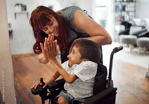 Fotografi Hairdresser, high five and child in hair salon happy with hair cut or hairstyle