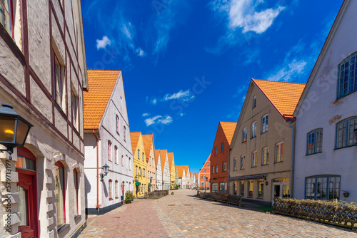 Street with colourful houses in Jakriborg, Sweden.