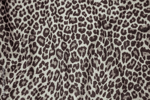 Leopard effect, fabric pattern. Background sample, seamless background print texture. Animal textil design.