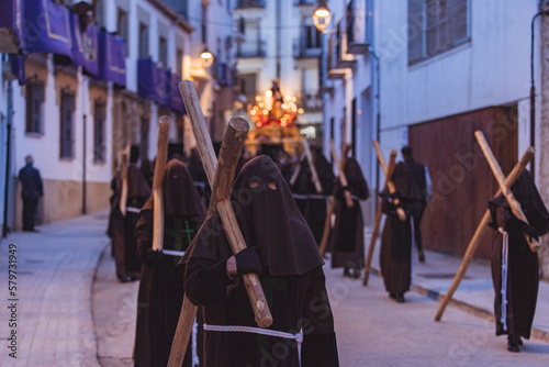 nazarene with a cross in procession