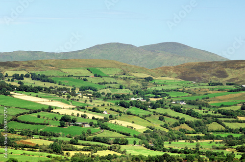 Sperrin Mountains, County Tyrone, Northern Ireland. Northeast over farmland landscape valley of the Owenkillew River to Sawel Mountain