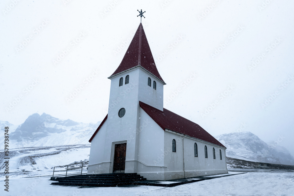 Reyniskirkja Church on the southern coast of Vik, Iceland on a cloudy snow winter day