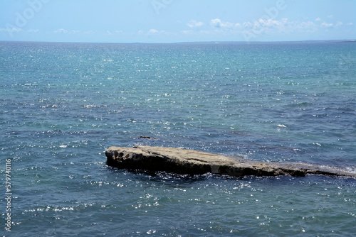 Wonderful Sicily with the scents of the Mediterranean scrub with evergreen bushes and conifers and the turquoise blue of its crystalline waters. © aliberti