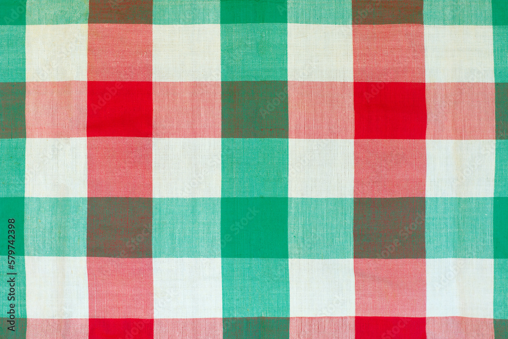 Red and green checkered tablecloth as background, closeup of photo Red and green checkered tablecloth as background, closeup of photo