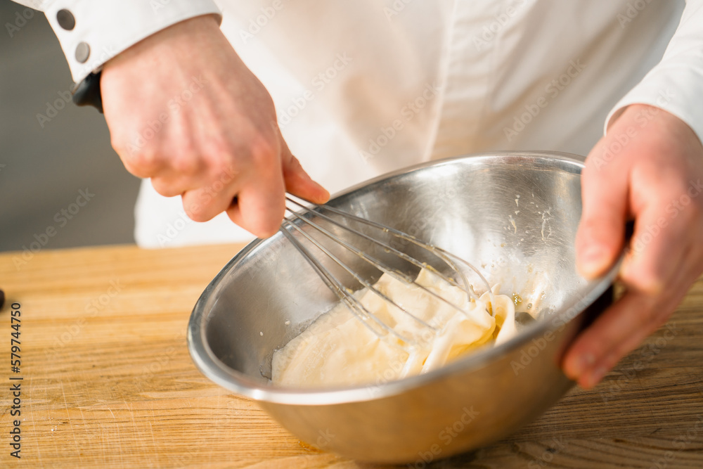 Professional kitchen chef prepares pancakes kitchen utensils