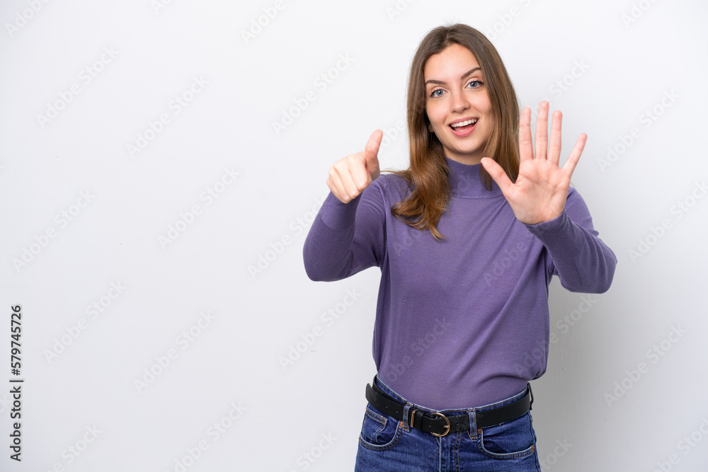 Young caucasian woman isolated on white background counting six with fingers Young caucasian woman isolated on white background counting six with fingers