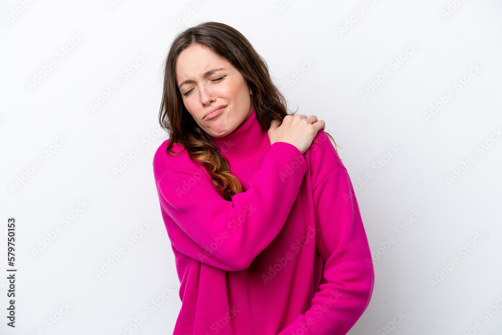 Young caucasian woman isolated on white background suffering from pain in shoulder for having made an effort Young caucasian woman isolated on white background suffering from pain in shoulder for having made an effort