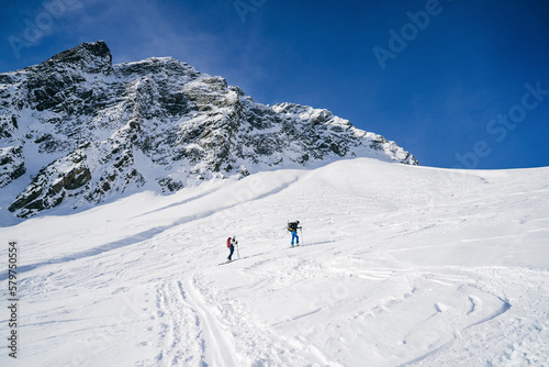 Ski tour in a beautiful winter landscape. Ski mountaineering. Mountains covered with snow 