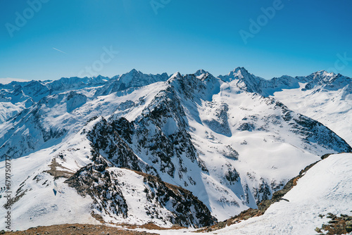 Alpine panorama in winter. Ski tour in a beautiful winter landscape