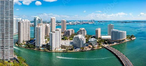 Aerial panorama of Brickell Key in Miami, Florida. Brickell Key (also called Claughton Island) is a man-made island off the mainland Brickell neighborhood of Miami, Florida. photo