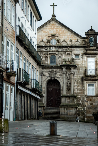 Frontal view of the facade of the Cathedral of Braga and the square's houses. Braga, Portugal