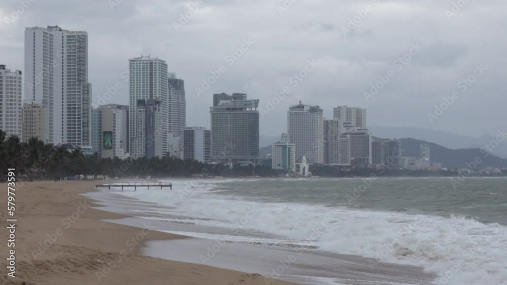 view of the city in bad weather and strong waves view of the city in bad weather and strong waves