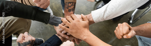 Top view of interracial people with alcohol addiction holding hands in rehab center, banner.