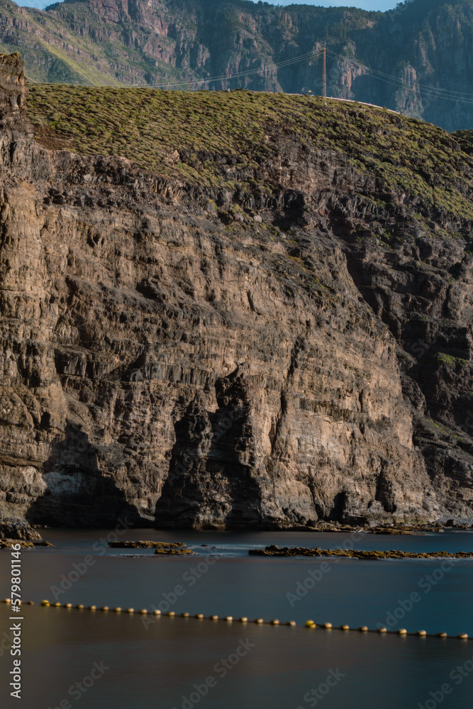 Obraz premium View of broken Dedo de Dios rock formation in Puerto de las Nieves, Agaete, in the northern coast of Gran Canaria, Spain