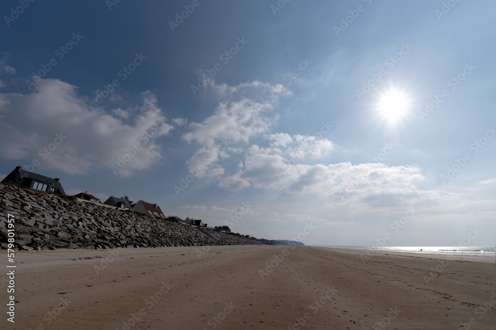 Beach and riprap of Jullouville in the Cotentin coast