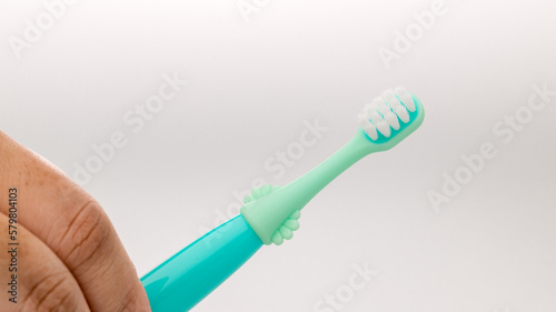 Toothbrush of baby health care. Toothbrush for young baby. 