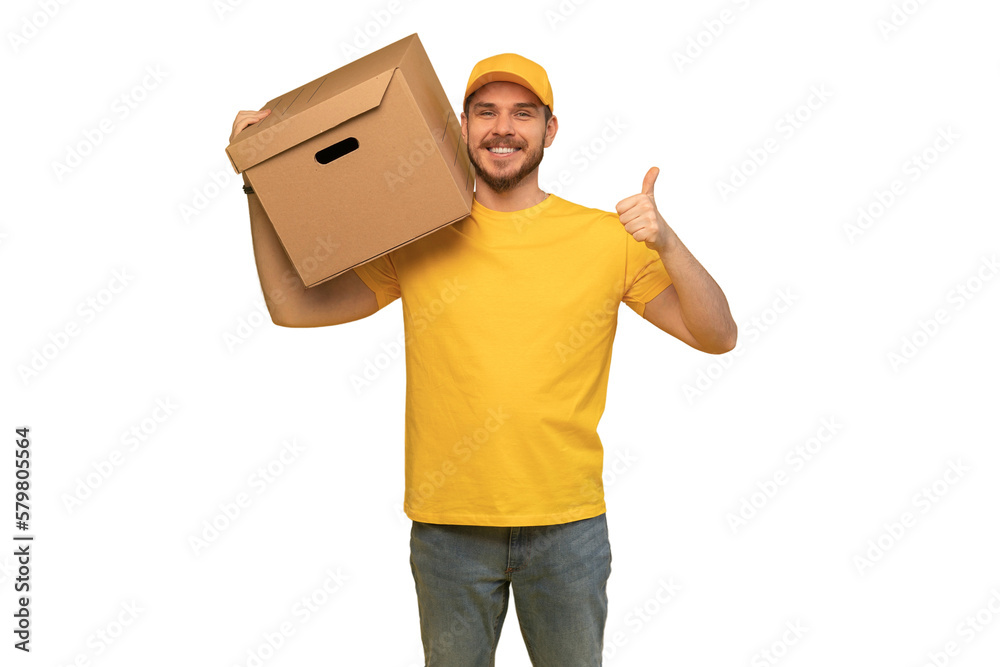 Portrait of excited delivery man in yellow uniform holding paper box isolated over transparent background Portrait of excited delivery man in yellow uniform holding paper box isolated over transparent background