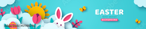 Happy Easter card, bunny rabbit, sun, eggs flowers and butterfly in white clouds, spring border frame. Modern concept background. Vector illustration. Place for text. Hare head, paper cut header.