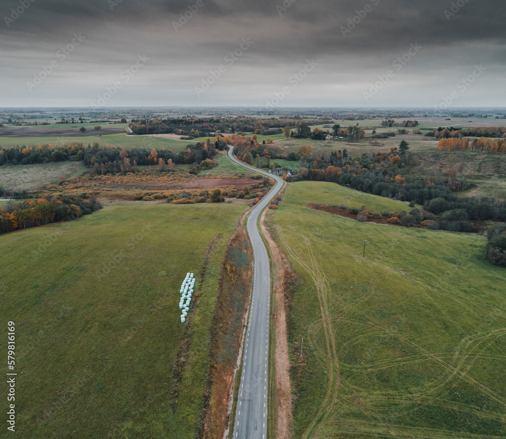 Aerial view of road in autumn time in Urvaste, Estonia. Aerial view of road in autumn time in Urvaste, Estonia.